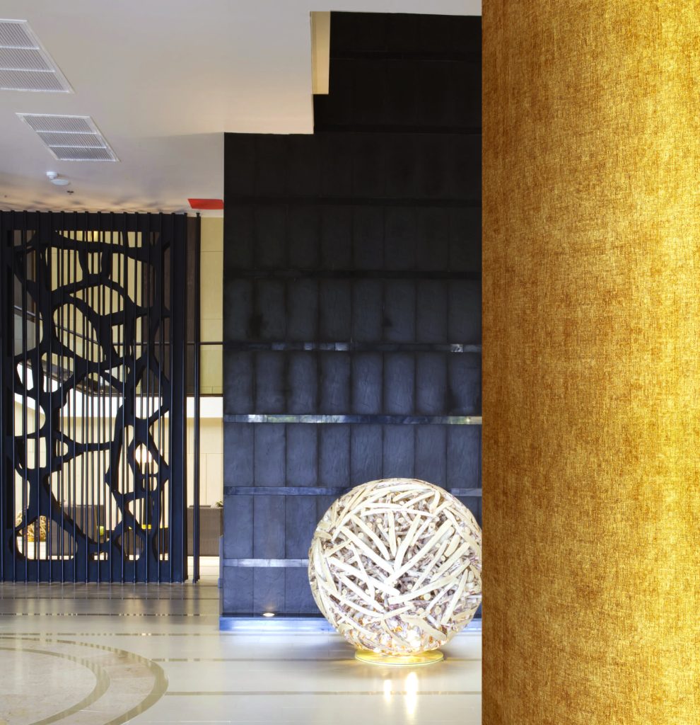 Public restroom refurbishment using wrap finishes